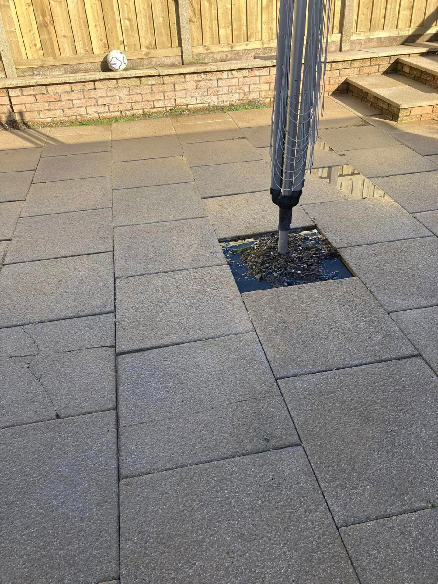 Same patio cleaned with pressure jetting